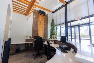 front desk and waiting room inside of Pine Hills Dentistry in Grass Valley, CA